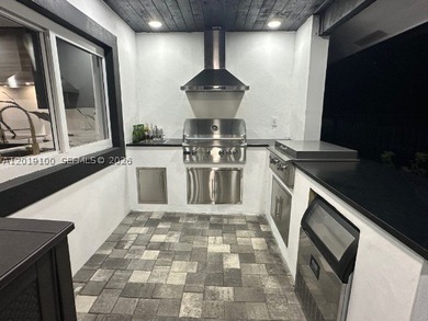 Welcome to this fully reimagined luxury residence in Davie - photo 35