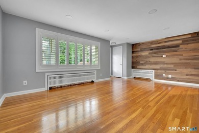 Beautifully updated and deceptively spacious, this move-in ready - photo 4