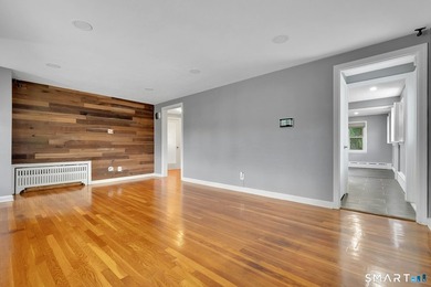 Beautifully updated and deceptively spacious, this move-in ready - photo 5