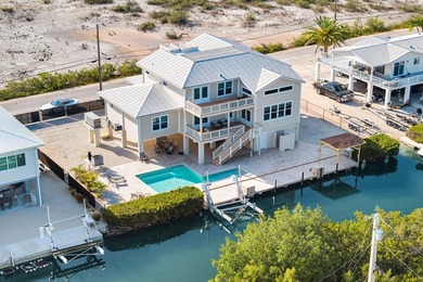 Spectacular sunset views from this custom-built, fully furnished - photo 49
