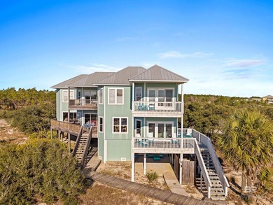 Just steps from the Gulf, this stunning four-bedroom, three-bath - photo 1