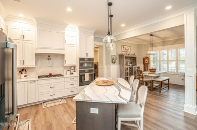 Welcome to 6189 Castlebrook Way, an exceptional custom-built - photo 27