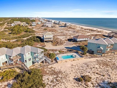 Just steps from the Gulf, this stunning four-bedroom, three-bath - photo 9