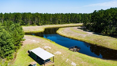 Hidden Lake Retreat consists of 2 large tracts of investment- - photo 34