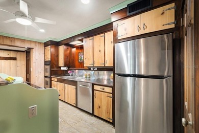 Set on over 3 acres in the heart of Ormond Beach, this - photo 11