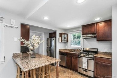 Tucked away on a quiet one-way street in the heart of West Islip - photo 12