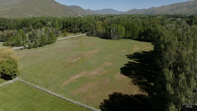 Explore this rare 14-acre riverfront property spanning both - photo 3