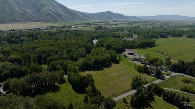 Explore this rare 14-acre riverfront property spanning both - photo 4