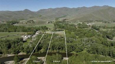 Explore this rare 14-acre riverfront property spanning both - photo 7