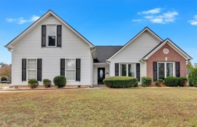 Lake Home For Sale in Flowery Branch, Georgia