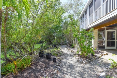 Located in the peaceful National Key Deer Refuge, this charming - photo 27