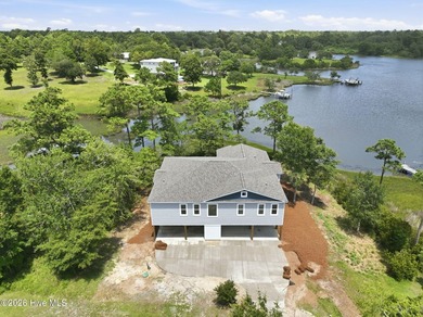 Experience an extraordinary waterfront retreat where custom - photo 10
