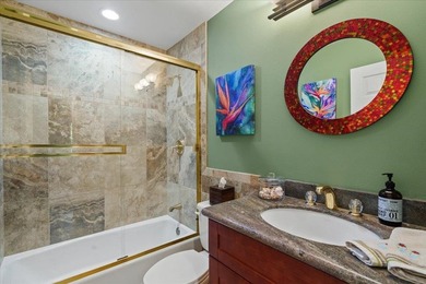 Stunning 2-bedroom, 2-bath upper-level furnished unit with - photo 22