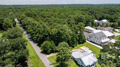 Nestled in a quiet, natural setting in Point Clear, this lot - photo 4