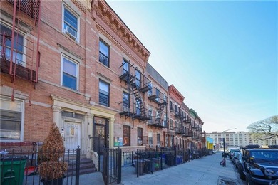 This is an excellent opportunity to own an oversized 3-family - photo 3