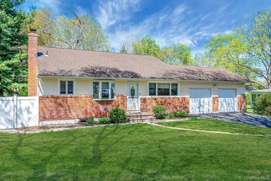 Welcome to this charming single-family split ranch nestled in a - photo 1