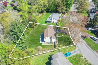 Welcome to this charming single-family split ranch nestled in a - photo 2