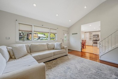 Welcome to this charming single-family split ranch nestled in a - photo 3
