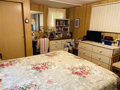 This home is in a senior park with a monthly lot rent of $583.00 - photo 7