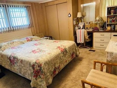 This home is in a senior park with a monthly lot rent of $583.00 - photo 8
