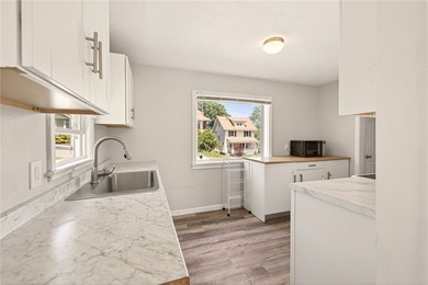 Welcome to 129 Wyndham, a move-in ready home offering the - photo 9