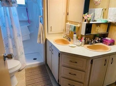 This home is in a senior park with a monthly lot rent of $583.00 - photo 9