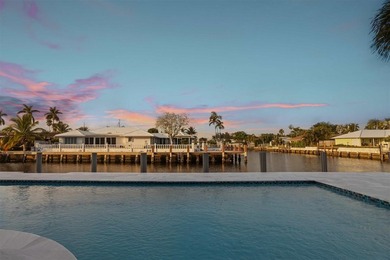 Experience luxury waterfront living in this extensively - photo 15