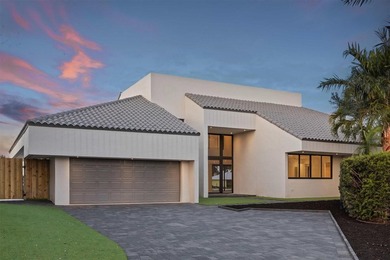 Experience luxury waterfront living in this extensively - photo 17