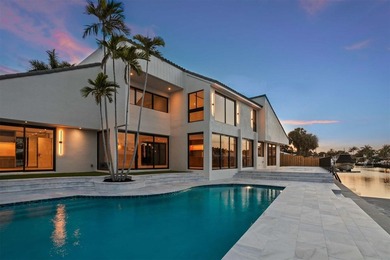 Experience luxury waterfront living in this extensively - photo 19