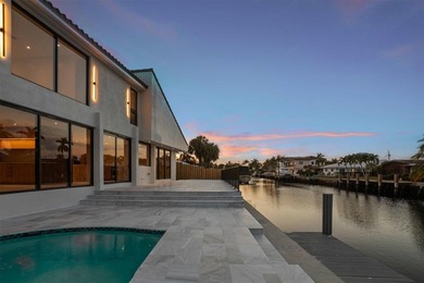 Experience luxury waterfront living in this extensively - photo 21
