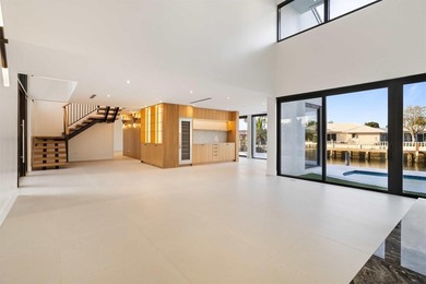 Experience luxury waterfront living in this extensively - photo 23
