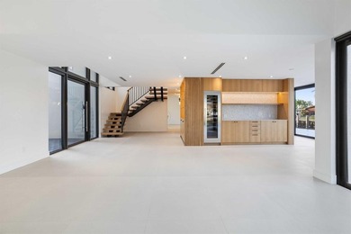 Experience luxury waterfront living in this extensively - photo 24
