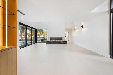 Experience luxury waterfront living in this extensively - photo 27
