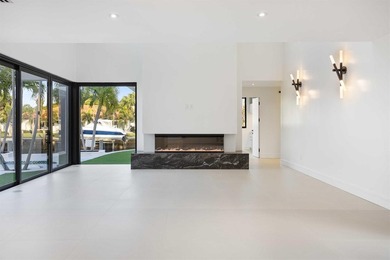 Experience luxury waterfront living in this extensively - photo 28