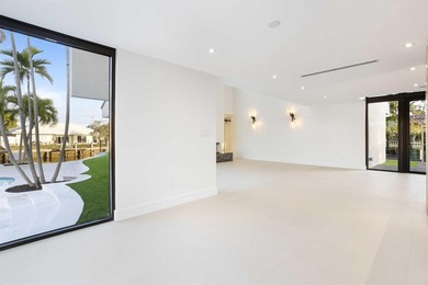 Experience luxury waterfront living in this extensively - photo 29