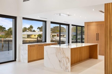 Experience luxury waterfront living in this extensively - photo 33