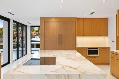 Experience luxury waterfront living in this extensively - photo 34