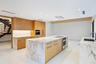 Experience luxury waterfront living in this extensively - photo 36