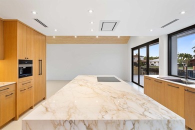Experience luxury waterfront living in this extensively - photo 37