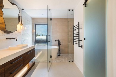 Experience luxury waterfront living in this extensively - photo 47