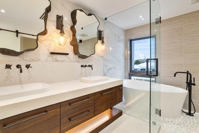 Experience luxury waterfront living in this extensively - photo 49