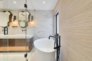 Experience luxury waterfront living in this extensively - photo 50