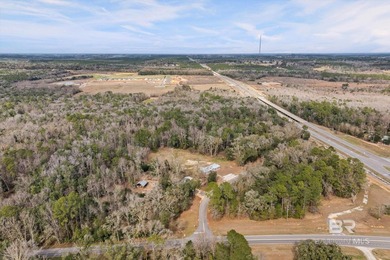 Discover the possibilities with this 5.8+/- acre parcel located - photo 8