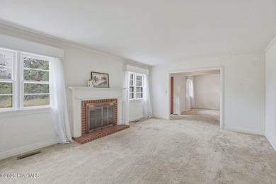 Step into the charm and character of this classic brick-front - photo 8