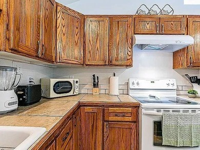 A rare gem, two completely remodeled elegant permitted home with - photo 8