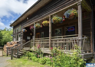 An incredible opportunity to own The Lost Resort, a rustic - photo 4