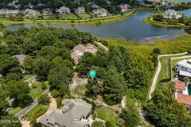 Nestled on a desirable cul-de-sac lot in the prestigious gated - photo 4
