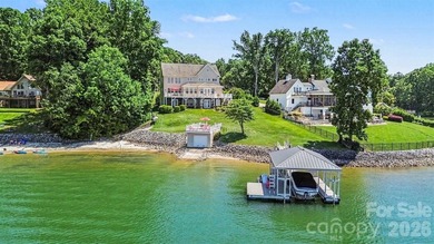With sweeping open-water views, a private beach, and an - photo 1