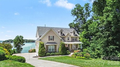 With sweeping open-water views, a private beach, and an - photo 2