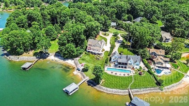 With sweeping open-water views, a private beach, and an - photo 5